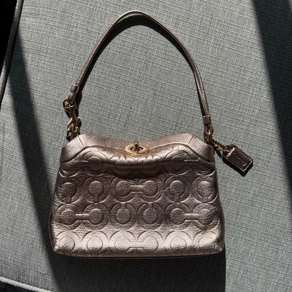 Coach Handbags - Coach Rose Gold Turnlock Mini Bag/Wristlet